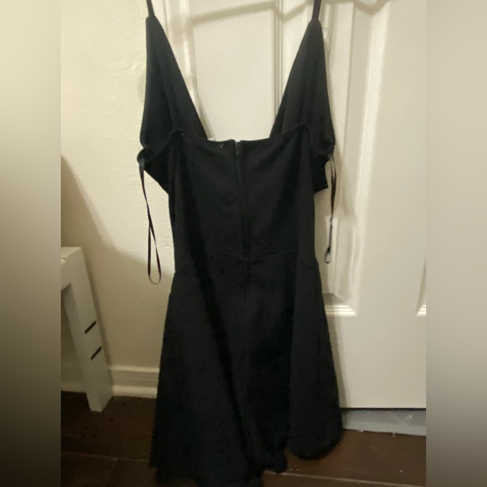 Revamped black dress with side holes and stomach hole